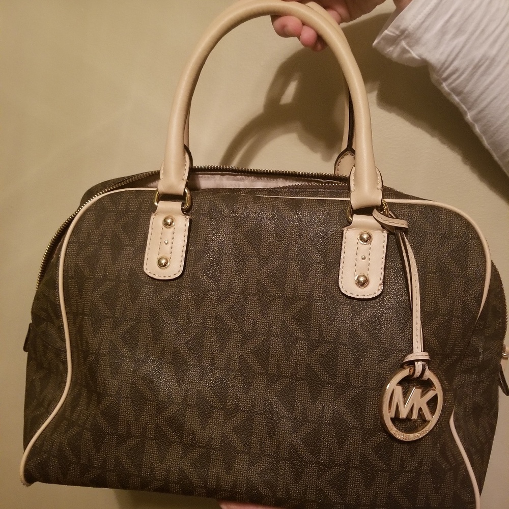 Aunthentic Classic MK print leather bag.